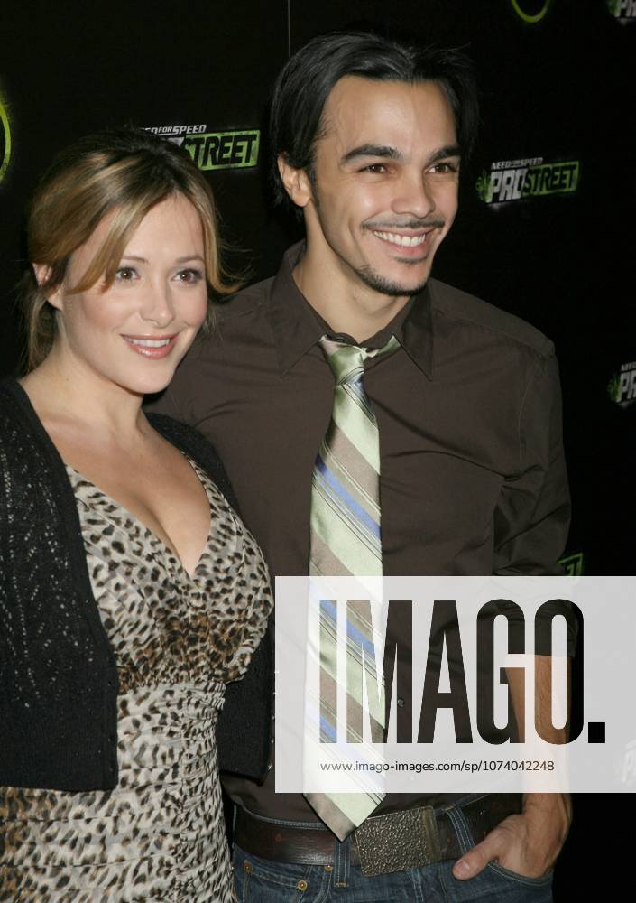 Hollywood, CA, U.S. - 13 November 2007 - Hollywood, California - Shalim Ortiz (right) and girlfriend Leslie Morchado. Electronic Arts, Inc. launch of Need for Speed ProStreet Game party hosted by Hayden Panettiere of Heroes at Les Deux. Photo Credit: Russ Elliot AdMedia