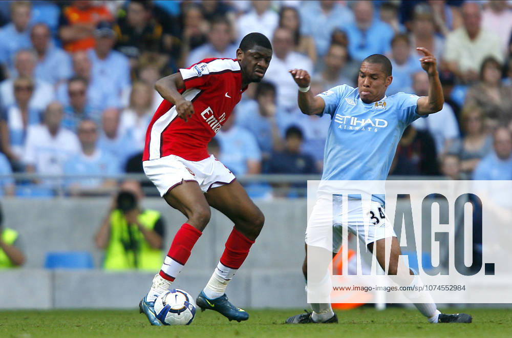 Manchester City V Arsenal, Premier League Abou Diaby of Arsenal and Nigel De Jong of Manchester City on the ball during the Premier League match between Manchester City and Arsenal at City Of Manchester Stadium on September 12, 2009 in Manchester, England. Manchester City Of Manchester Stadium England United Kingdom
