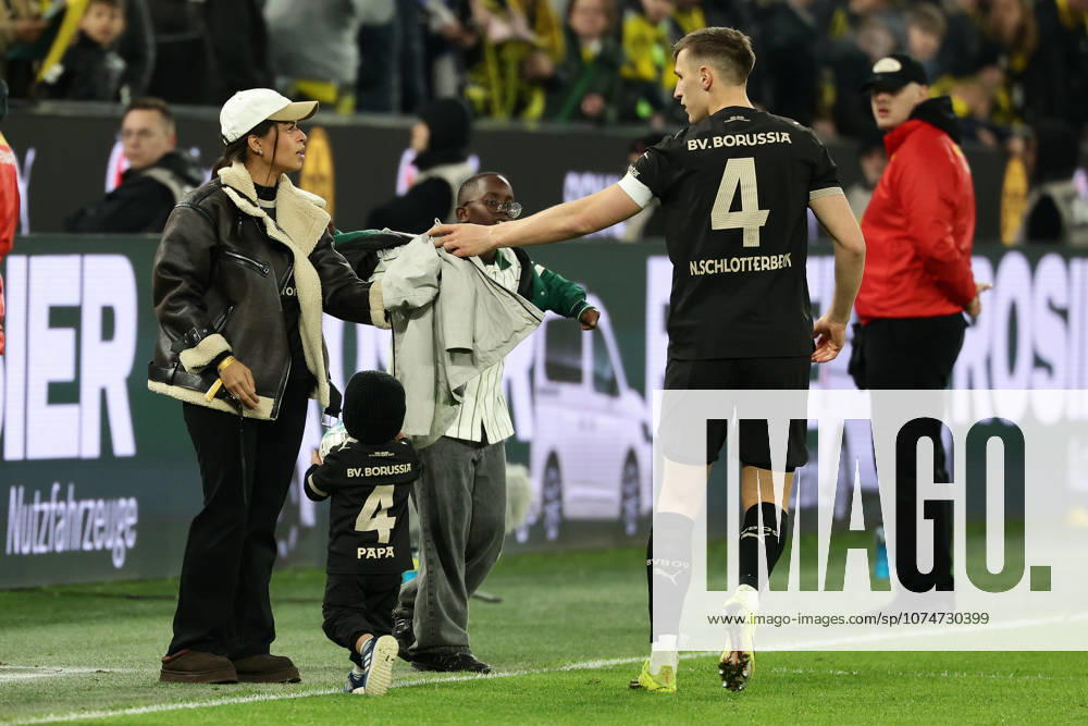 Dortmund, Germany, 21.03.26, Nico Schlotterbecks (Borussia Dortmund) Frau Sabrina mit Kind und Nico Schlotterbeck (Borussia Dortmund) während des Spiels der 1. Bundesliga zwischen Borussia Dortmund - Hamburger SV im Signal Iduna Park in Dortmund. (Photo by Joachim Bywaletz) DFB DFL REGULATIONS PROHIBIT ANY USE OF PHOTOGRAPHS AS IMAGE SEQUENCES AND OR QUASI-VIDEO.