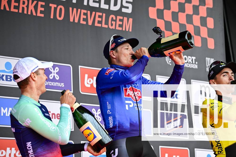 In Flanders Fields From Middelkerke to Wevelgem 2026 Cycling Race WEVELGEM, BELGIUM - MARCH 29 : Laporte Christophe (FRA) of Team Visma Lease a Bike, Andresen Tobias Lund (DEN) of Decathlon CMA CGM Team, Philipsen Jasper (BEL) of Alpecin Premier Tech celebrating his victory on the podium during the 88th edition of In Flanders Fields From Middelkerke to Wevelgem an UCI World Tour 1.UWT one day cycling road race for Men Elite of 240 km with start in Middelkerke and finish in Wevelgem on March 29, 2026 in Wevelgem, Belgium, 29 03 2026 ( Motordriver Guy De Vuyst - Wevelgem Belgium