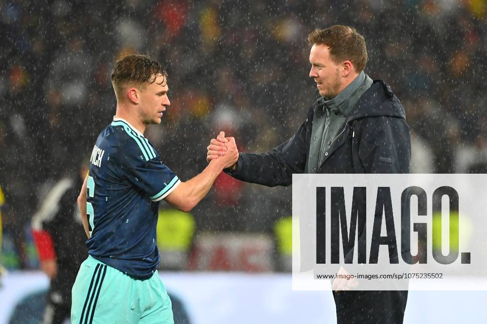 Schlussjubel Joshua KIMMICH (GER), Bundestrainer Julian NAGELSMANN (GER), shake hands. Fussball Laenderspiel Deutschland - Ghana 2-1 am 30.03.2026 MHP ARENA