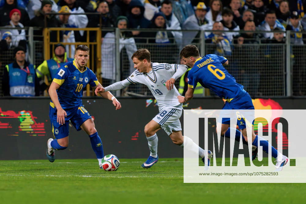 Nicolo Barella of Italy in action against Benjamin Tahirovic of Bosnia ed Erzegovina and Ermedin Demirovic of Bosnia ed Erzegovina during European Qualifiers PlayOff - Bosnia and Herzegovina vs Italy, FIFA World Cup, WM, Weltmeisterschaft, Fussball match in Zenica, Bosnia and Herzegovina, March 31 2026