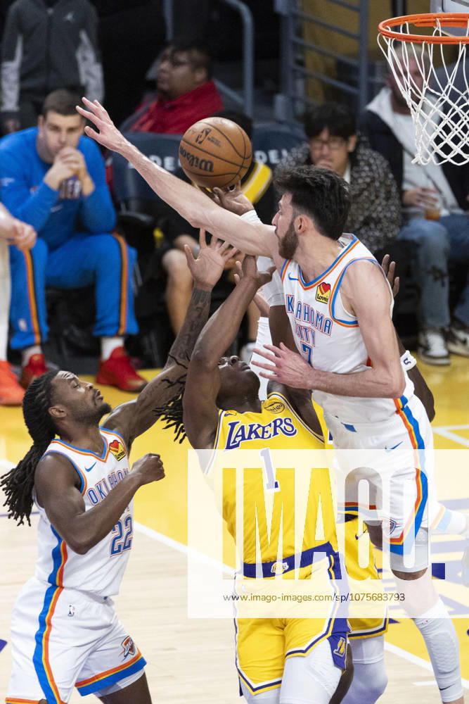 (260408) -- LOS ANGELES, April 8, 2026 -- Los Angeles Lakers Adou Thiero (C) goes for the basket under the pressure from Oklahoma City Thunder s Chet Holmgren (R) during the 2025-2026 NBA, Basketball Herren, USA regular season basketball game between Oklahoma City Thunder and Los Angeles Lakers in Los Angeles, the United States, April 7, 2026. (Photo by Xinhua) (SP)U.S.-LOS ANGELES-BASKETBALL-NBA-THUNDER VS LAKERS RingoxChiu