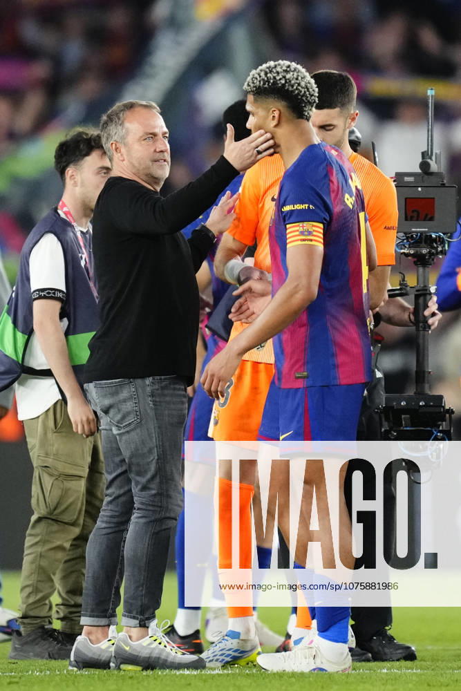 FC Barcelona, Barca v RCD Espanyol de Barcelona - LaLiga EA Sports Hansi Flick head coach of Barcelona and Ronald Araujo centre-back of Barcelona and Uruguay celebrate the victory after winning the LaLiga EA Sports match between FC Barcelona and RCD Espanyol de Barcelona at Spotify Camp Nou on April 11, 2026 in Barcelona, Spain. Barcelona Spain
