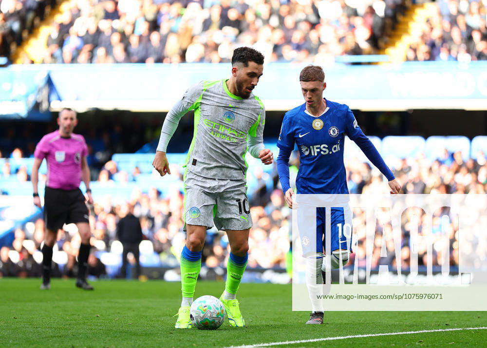 12th April 2026; Stamford Bridge, Chelsea, London, England: Premier League Football, Chelsea versus Manchester City; Rayan Cherki of Manchester City under pressure from Cole Palmer of Chelsea JPxFletcher