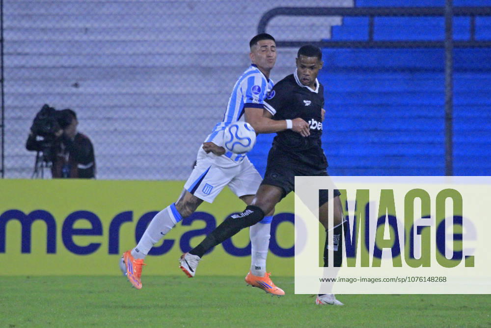 15th April 2026; Presidente Peron Stadium, Buenos Aires, Argentina; Copa Sudamericana Football Racing versus Botafogo; Ignacio Rodriguez of Racing battles for possession with Junior Santos of Botafogo PoolxPelaezxBurga DiaEsportivo