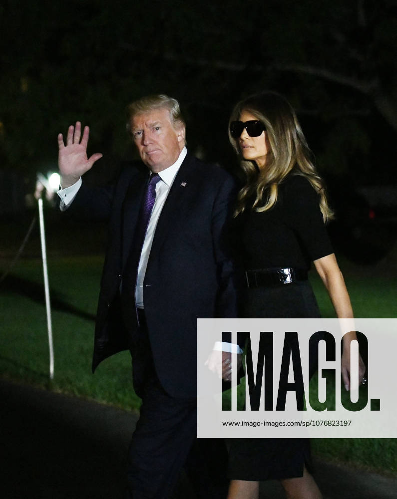 Washington, District of Columbia, United States of America - United States President Donald J. Trump and first lady Melania Trump return to the White House from Las Vegas, Nevada October 4, 2017. The President and the first lady visited with civilian heroes and first responders from the deadliest mass shooting in US history. .Credit: Olivier Douliery Pool via CNP