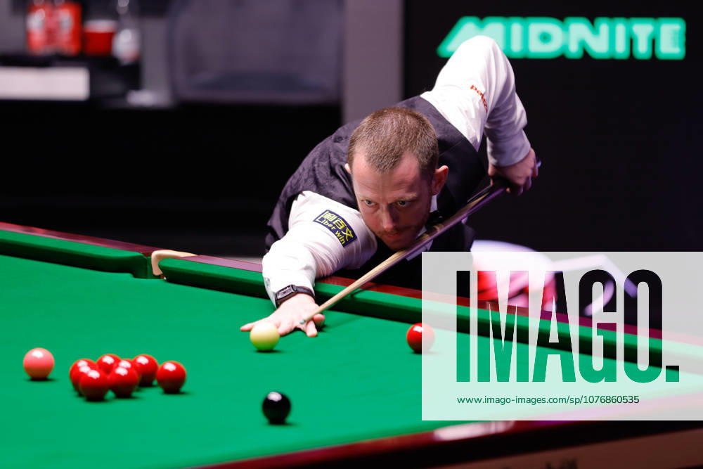 Mark Allen of Northern Ireland plays a shot in the Semifinal match against Wu Yize of China on day 14 of Halo World Championship, WM, Weltmeisterschaft 2026 at Crucible Theatre on May 1, 2026 in Sheffield, England.