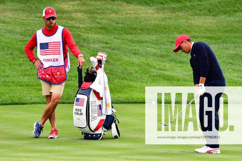 Jersey City, New Jersey, U.S - Rickie Fowler of the US Team chips onto the 15th green during Saturday matches of the Presidents Cup at Liberty National Golf Club in Jersey City, NJ