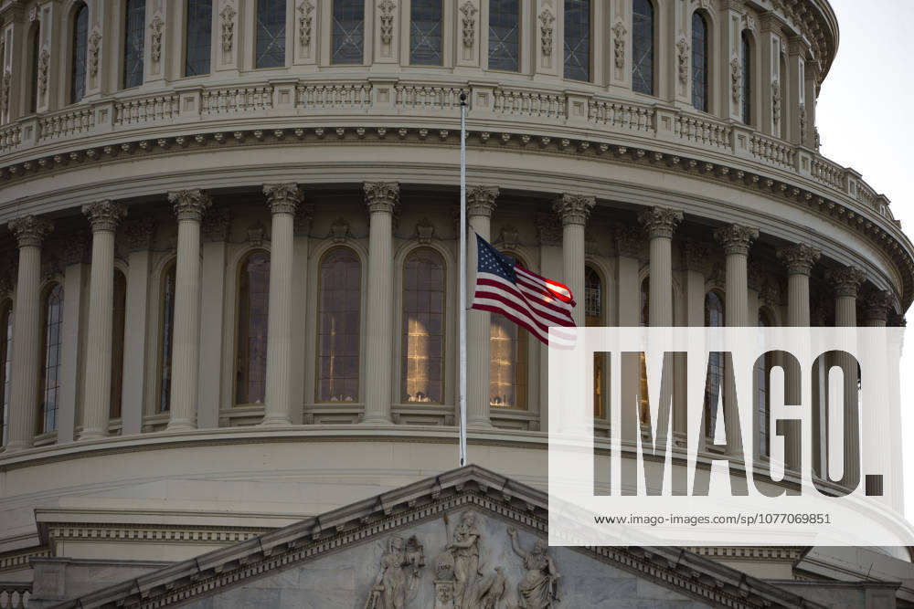 Washington, District Of Columbia, USA - The flag of the United States of America flies at half-staff above the United States Capitol Building a day after the deadliest mass shooting in American history in Las Vegas, Nevada.