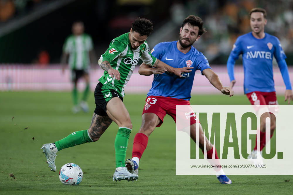 Real Betis V Elche CF - La Liga EA Sports Antony Matheus dos Santos of Real Betis competes for the ball with Victor Chust of Elche CF during the La Liga EA Sports match between Real Betis and Elche CF at La Cartuja Stadium in Seville, Spain, on May 12, 2026. Seville Spain
