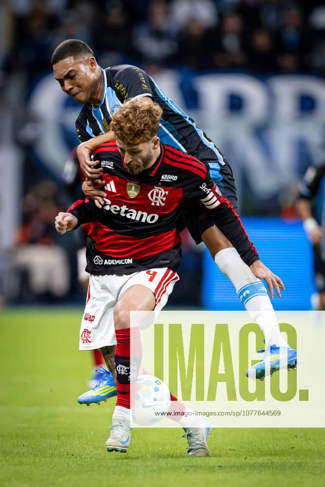 Carlos Vinicius of Gremio (L) battles for the ball with Leo Pereira of Flamengo (L) during the Campeonato Brasileiro Serie A match between Gremio and Flamengo at Arena do Gremio on May 10, 2026 in Porto Alegre, Brazil. (Photo by Richard Ducker Eurasia Images) Porto Algre Arena do Gremio Rio Grande do Sul Brazil