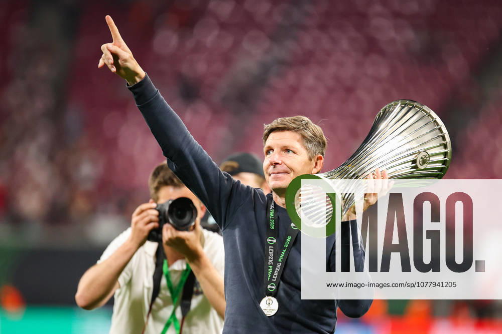 UEFA Conference League final: Crystal Palace FC Vs Rayo Vallecano Oliver Glasner coach celebrates a win with trophy during the UEFA Conference League Final 2026 match between Crystal Palace FC and Rayo Vallecano at Football Arena Leipzig.