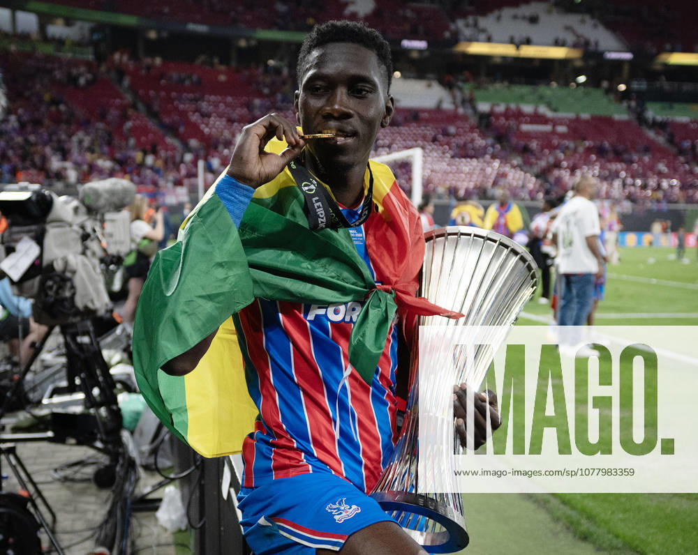 . - Crystal Palace v Rayo Vallecano, UEFA Conference League Final 2026, Red Bull Arena, Leipzig, Germany, 27th May 2026. Daniel Weir Crystal Pix Ismaila Sarr of Crystal Palace biting his UEFA Conference League 2026 Winners Medal and holding the Conference League Trophy. - Crystal Palace v Rayo Vallecano, UEFA Conference League Final 2026, Red Bull Arena, Leipzig, Germany, 27th May 2026. Daniel Weir Crystal Pix Leipzig Red Bull Arena Germany