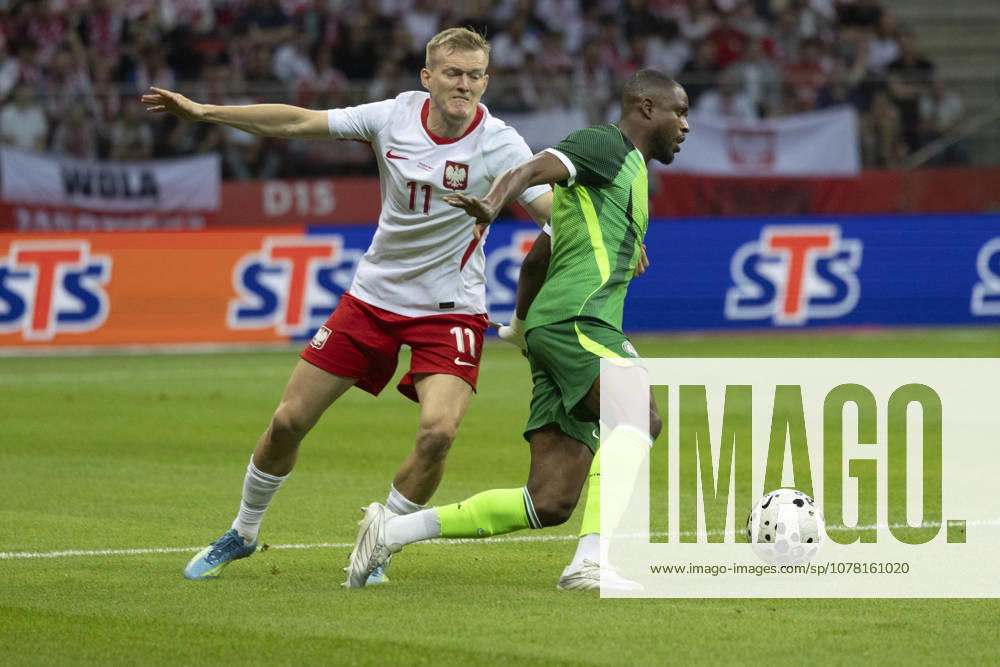 Fußball, Testspiel, Polen - Nigeria Poland - Nigeria 03.06.2026 football, Warsaw, PGE National Stadium, FIFA , friendly international game match Poland - Nigeria ( mecz towarzyski, pilka nozna, Polska - Nigeria ) image shows: Karol Swiderski (L) Frank Onyeka (R) photo Katarzyna Plewczynska Fotostyk