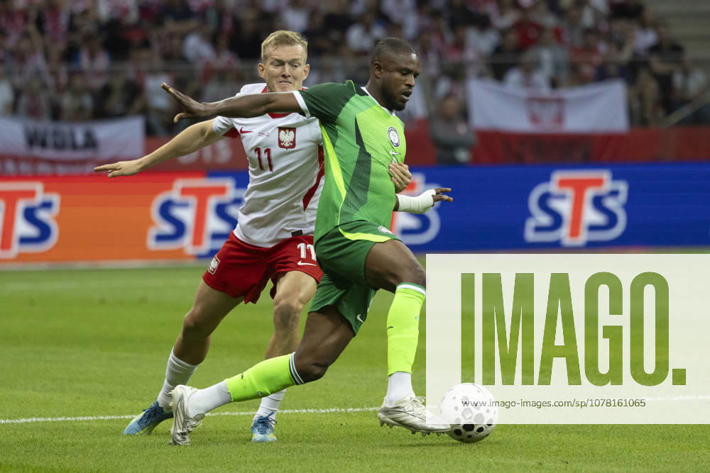 Fußball, Testspiel, Polen - Nigeria Poland - Nigeria 03.06.2026 football, Warsaw, PGE National Stadium, FIFA , friendly international game match Poland - Nigeria ( mecz towarzyski, pilka nozna, Polska - Nigeria ) image shows: Karol Swiderski (L) Frank Onyeka (R) photo Katarzyna Plewczynska Fotostyk