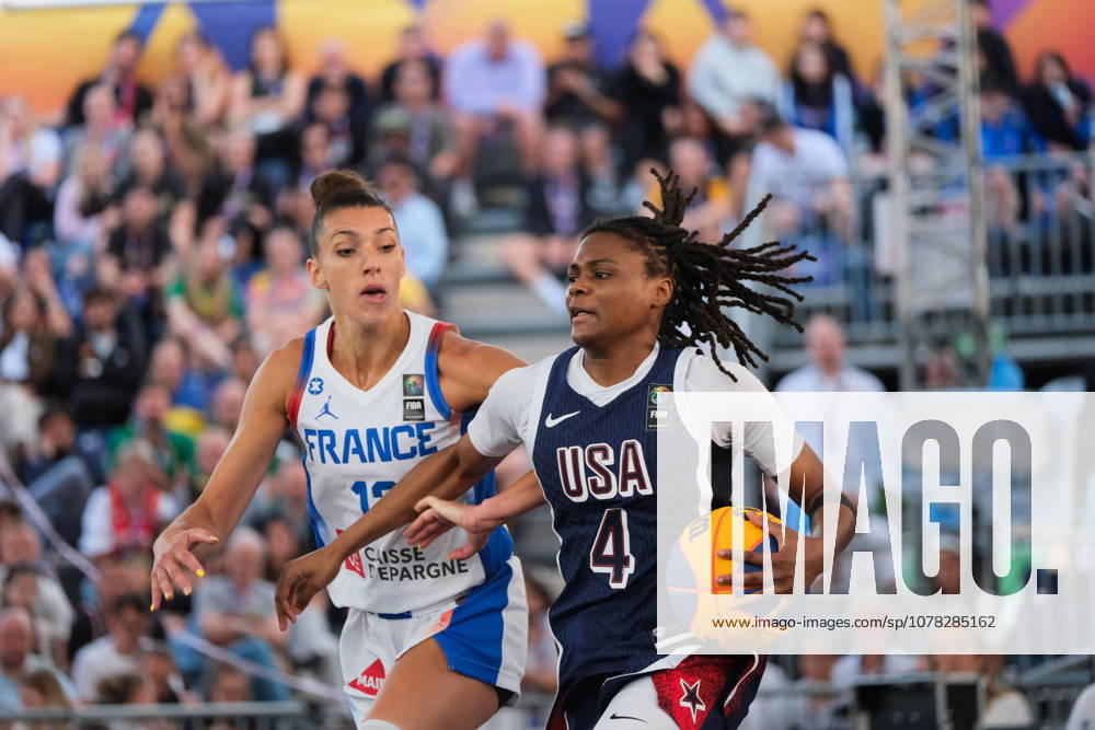 USA s MILAYSIA FULWILEY (4) and France s LAETITIA GUAPO (12) in action during a FIBA 3x3 Basketball World Cup women s quarter-final game between France and USA in Warsaw, Poland. Warsaw Poland - ZUMAk204 20260606_zip_k204_088