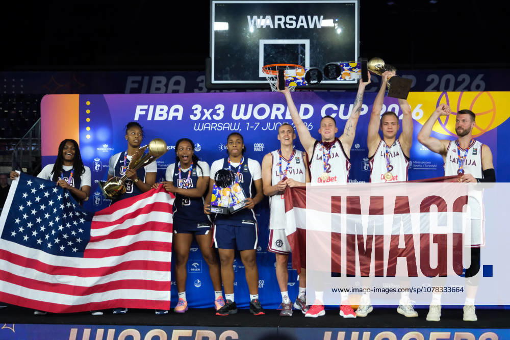 USA s MILAYSIA FULWILEY (4), MIKAYLAH WILLIAMS (12), SAHARA WILLIAMS (6), and JOYCE EDWARDS (13) celebrate with their women s 1st place medals and the world champions trophy; Latvia s FRANCIS LACIS (6), NAURIS MIEZIS (1), KARLIS LASMANIS (2), and ZIGMARS RAIMO (9) celebrate with their men s 1st place medals and men s world champions trophy during the prize ceremony at the conclusion of the 2026 FIBA 3x3 Basketball World Cup in Warsaw, Poland. Warsaw Poland - ZUMAk204 20260607_zip_k204_103