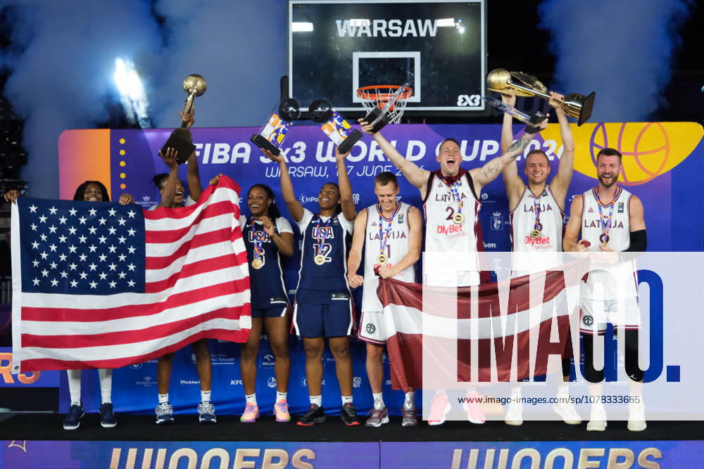 USA s MILAYSIA FULWILEY (4), MIKAYLAH WILLIAMS (12), SAHARA WILLIAMS (6), and JOYCE EDWARDS (13) celebrate with their women s 1st place medals and the world champions trophy; Latvia s FRANCIS LACIS (6), NAURIS MIEZIS (1), KARLIS LASMANIS (2), and ZIGMARS RAIMO (9) celebrate with their men s 1st place medals and men s world champions trophy during the prize ceremony at the conclusion of the 2026 FIBA 3x3 Basketball World Cup in Warsaw, Poland. Warsaw Poland - ZUMAk204 20260607_zip_k204_104