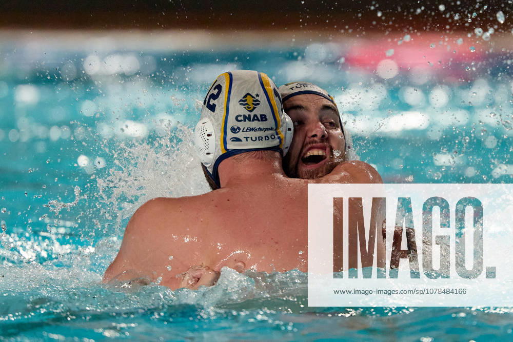 Alejandro Bustos Sanchez (left) of Zodiac CNAB reacts in celebration with a team-mate after winning the European Aquatics Mens Water polo, Wasserball Champions League gold‘medal match against Pro Recco at the National Pool, Tal‘Qroqq, Malta, on 13 June 2026. Zodiac CNAB v Pro Recco - Mens Water Polo Men Champions League 2026 Final; EA_CL_2026_MLT