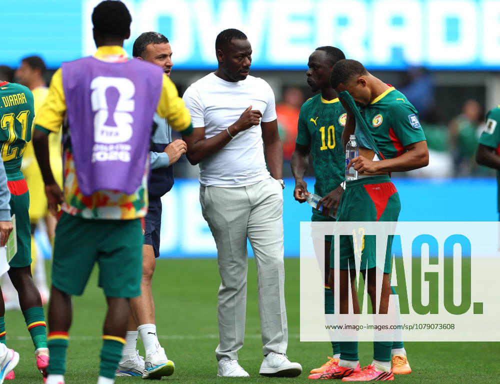 (260702) -- SEATTLE, July 2, 2026 -- Senegal s head coach Pape Thiaw (3rd R) gives instructions to players in a hydration break during the round of 32 match between Belgium and Senegal at the 2026 FIFA World Cup, WM, Weltmeisterschaft, Fussball at Seattle Stadium in Seattle, the United States, July 1, 2026. ) (SP)U.S.-SEATTLE-FOOTBALL-FIFA WORLD CUP-ROUND OF 32-BEL VS SEN MaoxSiqian