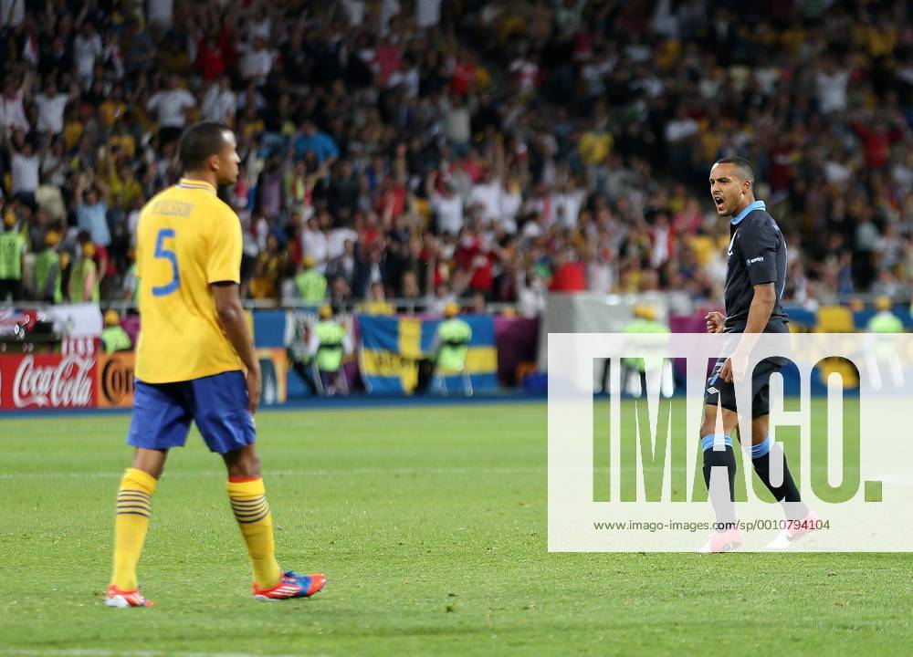 Englands Theo Walcott celebrates scoring his sides second goal..Euro 2012 Sweden v England, Olympic Stadium, Kiev, 15th June 2012. Pic David Klein SPORTIMAGE .