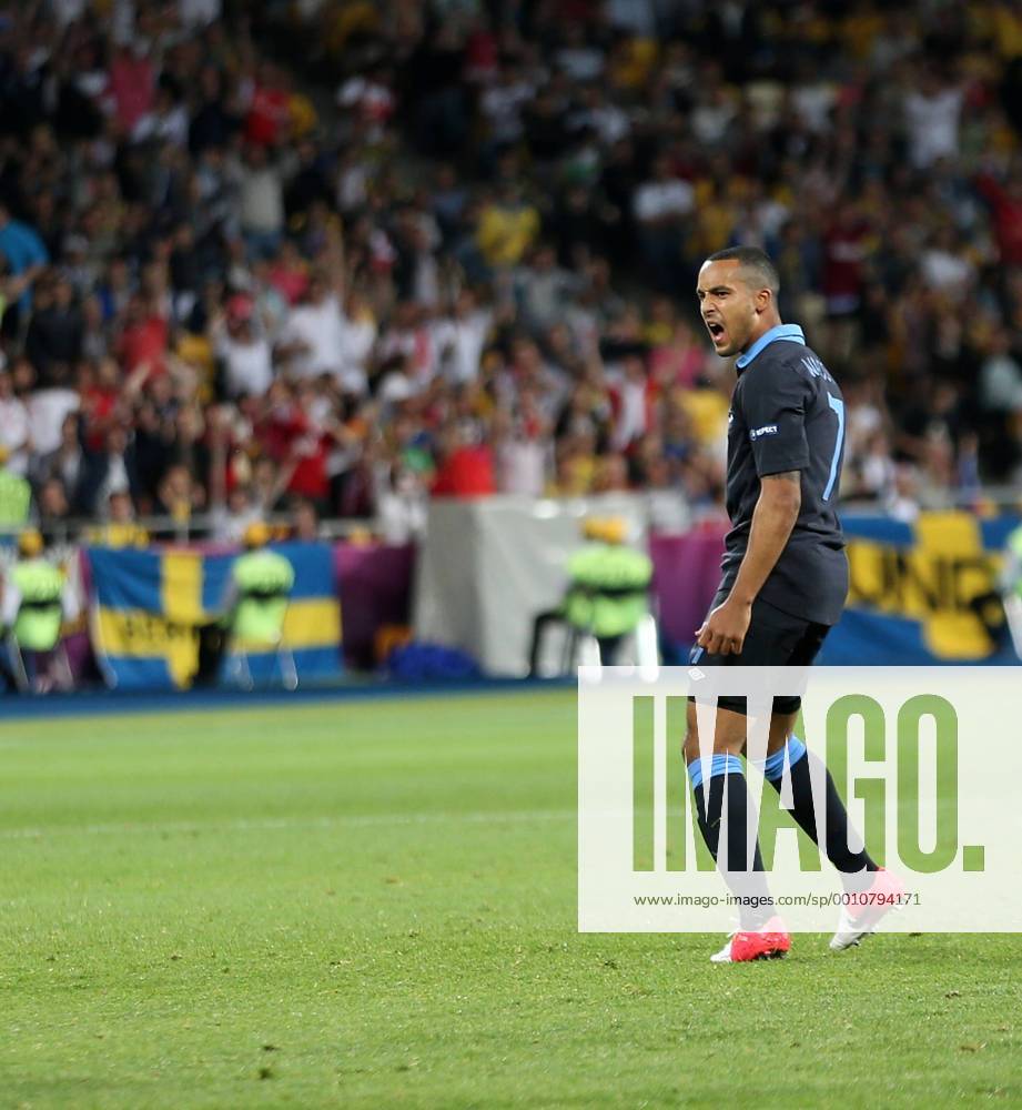 Englands Theo Walcott celebrates scoring his sides second goal..Euro 2012 Sweden v England, Olympic Stadium, Kiev, 15th June 2012. Pic David Klein SPORTIMAGE .