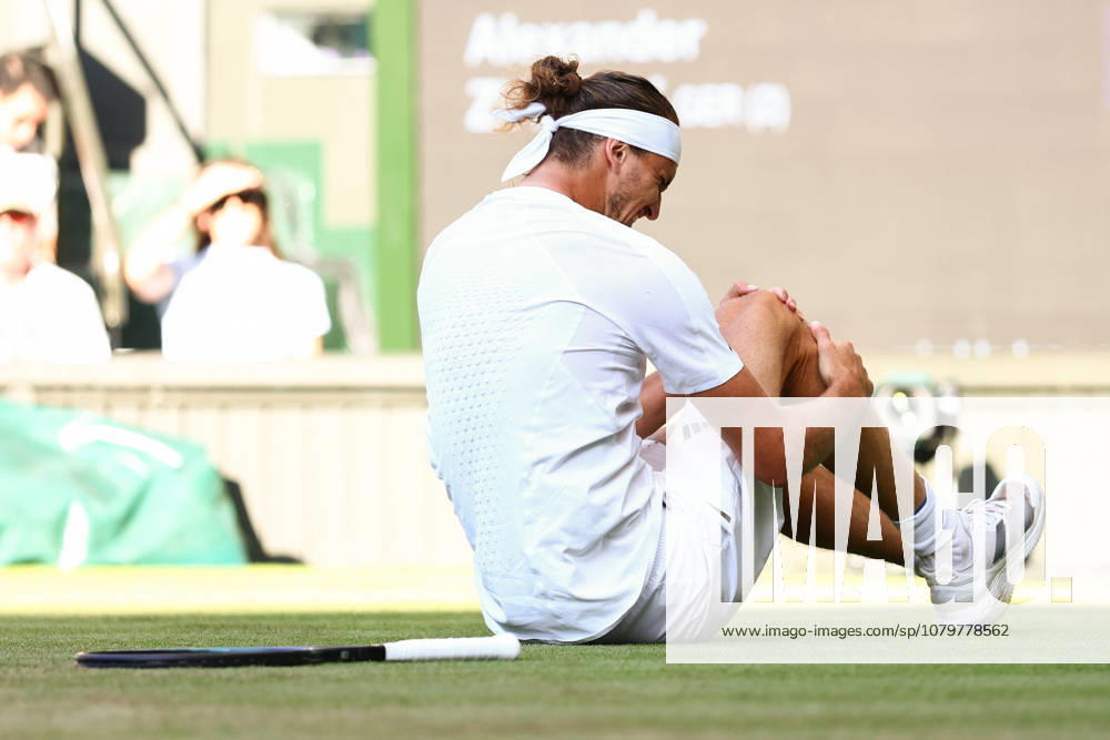 Alexander Zverev falls during the Men s Singles final Wimbledon Tennis Championships, Day 14, The All England Lawn Tennis and Croquet Club, London, UK - 12 Jul 2026London The All England Lawn Tennis and United Kingdom