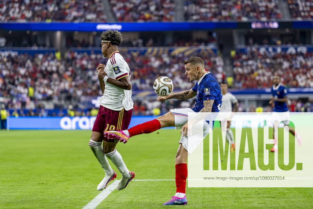 DALLAS - (lr) Lamine Yamal of Spain and Lucas Digne of France during the 2026 World Cup match between France and Spain at Dallas Stadium on July 14, 2026, in Dallas, United States. (Photo by Stefan Koops EYE4IMAGES DeFodi Images) -