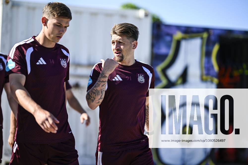Anderlecht s Danylo Sikan and Anderlecht s Adriano Bertaccini arrive for a training session of Belgian RSC Anderlecht, Wednesday 29 July in Brussels, in preparations of the second leg of the second qualifying round for the UEFA Europa League against Swedish Hammarby IF. TOM GOYVAERTS TomxGoyvaerts x182288035x