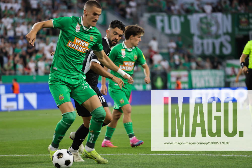 SOCCER - UEFA ECL, Rapid vs Coloma VIENNA,AUSTRIA,29.JUL.26 - SOCCER - UEFA Conference League, qualification, SK Rapid Wien vs FC Santa Coloma. Image shows Nenad Cvetkovic (Rapid) and Adria Arjona (Coloma). GEPAxpictures Bitzan