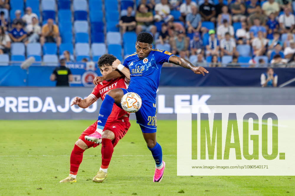 Cesar Blackman of SK Slovan Bratislava and Zviad Natchkhebia of Iberia 1999 Tbilisi seen during UEFA Champions league second qualifying round game between teams of SK Slovan Bratislava and Iberia 1999 Tbilisi (Dominika Kortvelyesiova Ball Raw Images) Bratislava Tehelne Pole stadium Slovakia