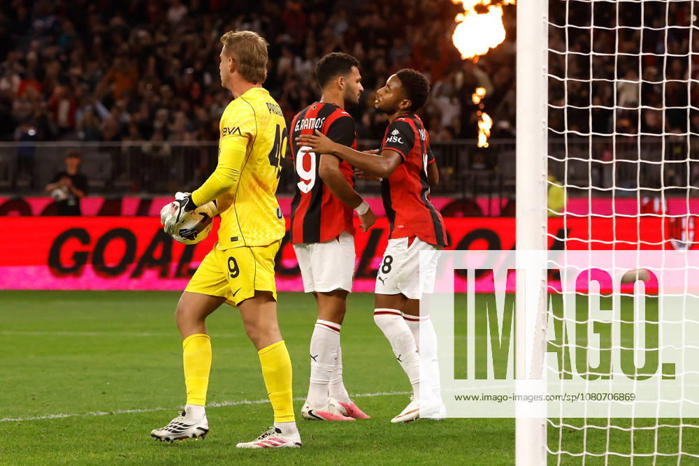 SOCCER AC MILAN INTER, Christopher Nkunku (right) of AC Milan is congratulated by Goncalo Ramos after scoring a penalty during the AC Milan vs Inter Milan soccer exhibition match at Optus Stadium in Perth, Wednesday, August 5, 2026. ( NO ARCHIVING PERTH WESTERN AUSTRALIA AUSTRALIA
