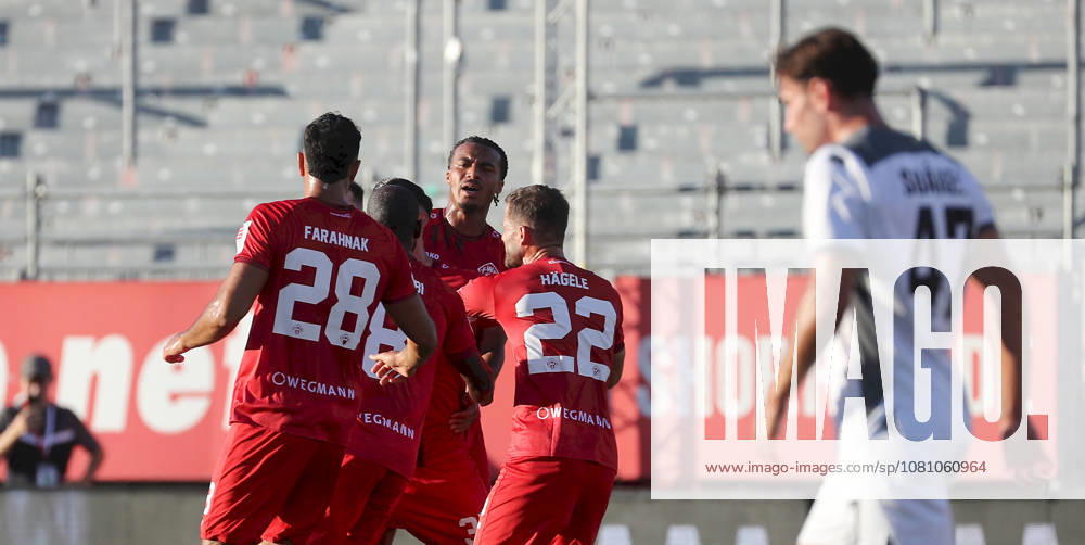 Herren, Fussball, Saison 2026 2027, 3. Liga, 2. Spieltag: FC Wuerzburger Kickers - SV Wehen Wiesbaden v.li.: Ebrahim Fahrahnak (FC Wuerzburger Kickers), Dominic Schmidt (FC Wuerzburger Kickers), David Abrangao (FC Wuerzburger Kickers), Daniel Haegele (FC Wuerzburger Kickers) mit Torjubel, celebrate the goal, goal celebration, Jubel ueber das Tor zum 1:0 durch Daniel Haegele (FC Wuerzburger Kickers), David Suarez (SV Wehen Wiesbaden) Wuerzburg AKON ARENA Bayern Deutschland