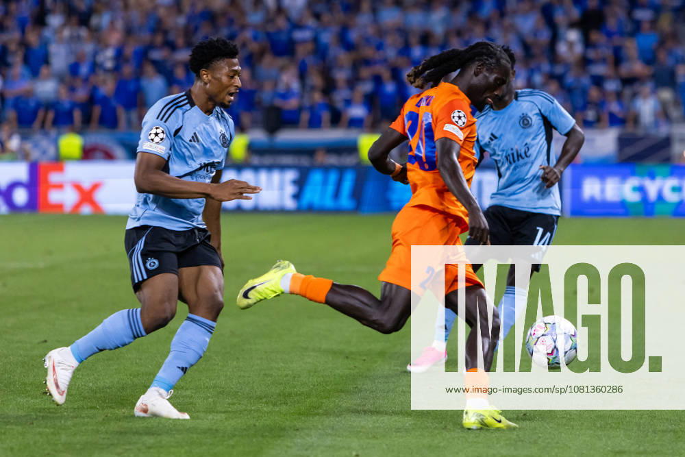 Rahim Ibrahim of SK Slovan Bratislava and Alpha Diounkou of Celje seen during UEFA Champions league first play-off game between teams of SK Slovan Bratislava and Celje (Dominika Kortvelyesiova Ball Raw Images) Bratislava Tehelne Pole stadium Slovakia
