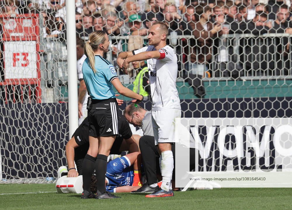Schiedsrichterin Fabienne Michel, Marian Kunze (Lueneburger SK Hansa) Fussball, Saison 2026 2027, Maenner, Herren, DFB Pokal, 1. Hauptrunde, Millerntor Stadion, Lueneburger SK gegen Werder Bremen DFL REGULATIONS PROHIBIT ANY USE OF PHOTOGRAPHS AS IMAGE SEQUENCES AND OR QUASI-VIDEO.