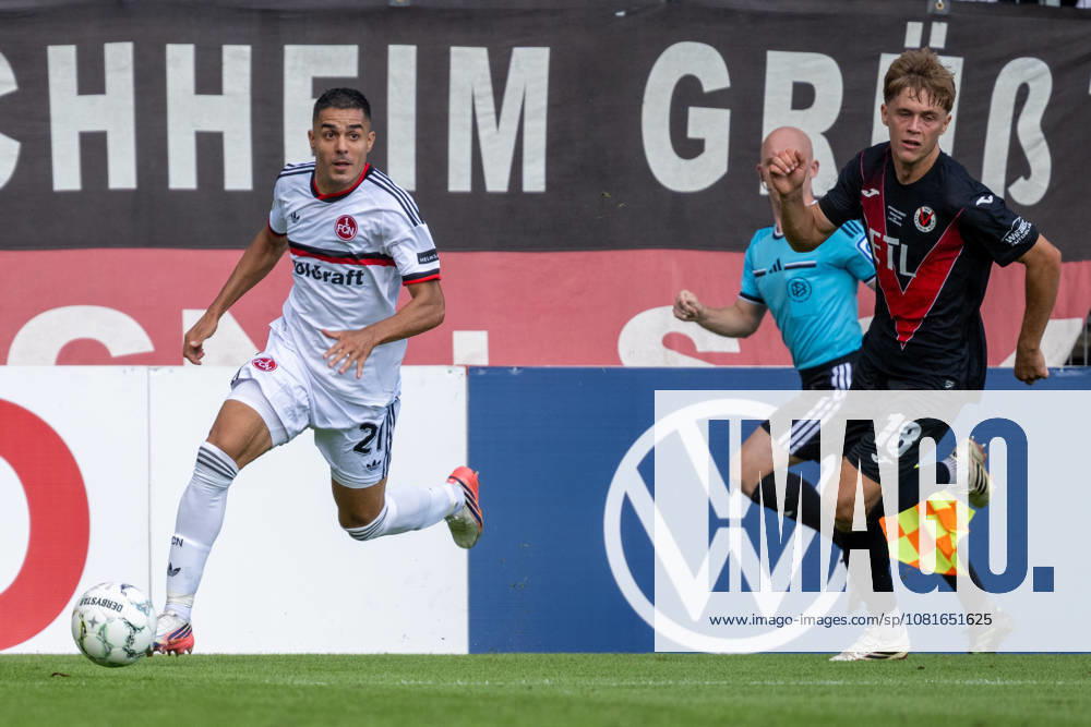 Zweikampf zwischen Ioannis Masouras (1. FC Nuernberg, 21) und Tim Kloss (Viktoria Koeln, 18). Viktoria Koeln vs. 1. FC Nuernberg, Fussball, DFB-Pokal, 1. Runde, Saison 2026 2027, 22.08.2026 DFL DFB Regulations prohibit any use of Photographs as image sequences and or Quasivideo Viktoria Koeln vs. 1. FC Nuernberg, Fussball, DFB-Pokal, 1. Runde, Saison 2026 2027, 22.08.2026 Koeln