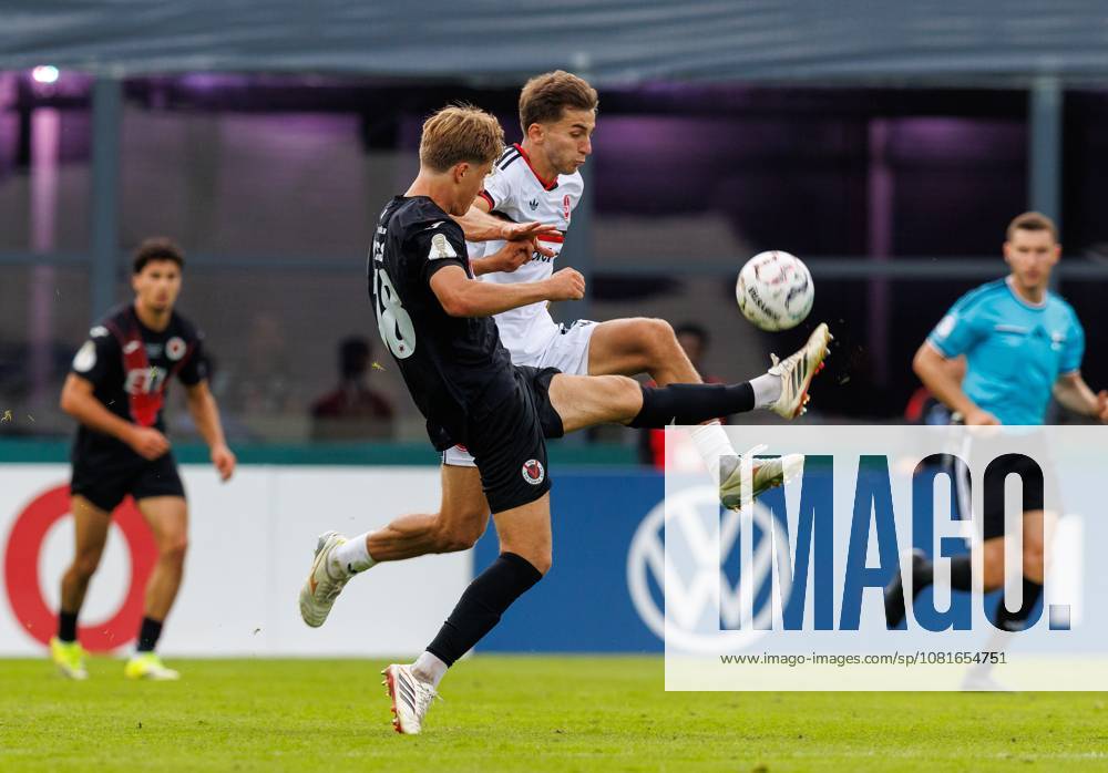 Fussball - Saison 2026 2027 - DFB Pokal Vereinspokal - 01. Runde: Viktoria Köln - 1. FC Nürnberg Nuernberg FCN ( Club ) - Sportfoto Zink DaMa - - regulations prohibit any use of photographs as image sequences and or quasi-video - Tim Kloss (18, FC Viktoria Köln ) Adam Markhiev (6, 1. FC Nürnberg FCN )