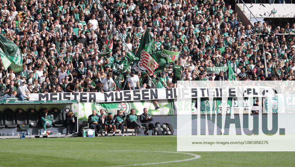 Banner der Werder Fans Meister muessen aufsteigen Fussball, Saison 2026 2027, Maenner, Herren, DFB Pokal, 1. Hauptrunde, Millerntor Stadion, Lueneburger SK gegen Werder Bremen , 0-3 DFL REGULATIONS PROHIBIT ANY USE OF PHOTOGRAPHS AS IMAGE SEQUENCES AND OR QUASI-VIDEO.