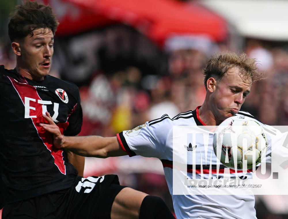 Fussball , DFB - Pokal , 1.Runde Viktoria Köln gegen 1.FC Nürnberg Alexander Prokopenko, links ( Viktoria Köln ) und Eric Porstner, rechts ( Nürnberg ) Köln
