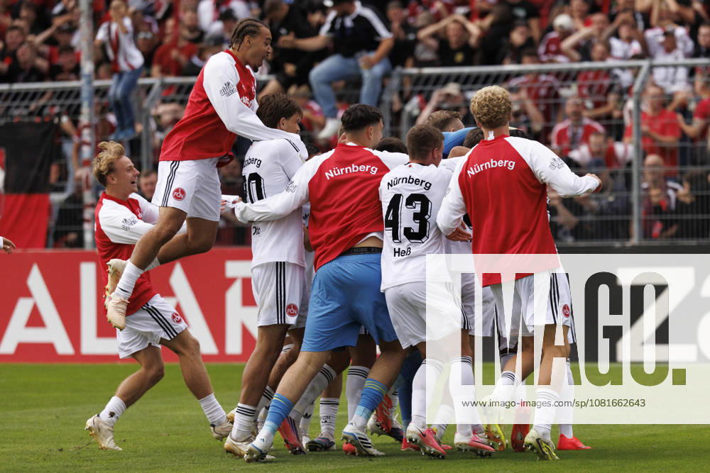 Jan Reichert (1. FC Nuernberg, 1) celebrates with teammates after the penalty shootout during the DFB-Cup match between Viktoria Koeln vs. 1. FC Nuernberg at the Sportpark Hoehenberg on August 22, 2026 in Koeln, Germany. DFL REGULATIONS PROHIBIT ANY USE OF PHOTOGRAPHS AS IMAGE SEQUENCES AND OR QUASI-VIDEO. Nordrhein-Westfalen Germany