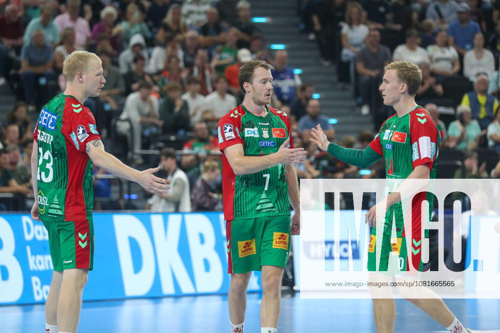 Handball - Rexel Super-Cup, SC Magdeburg - Füchse Berlin, v.l. Magnus Saugstrup (Magdeburg, 23), Felix Claar (Magdeburg, 7), Gisli Thorgeir Kristjansson (Magdeburg, 10) Jubel, Torjubel, jubelt ueber das Tor, celebrate the goal, celebration München