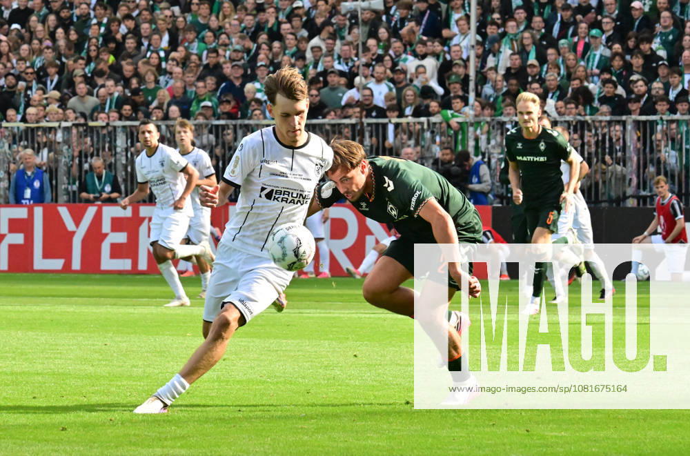 GER Fußball, Männer,DFB Pokal, 1.Runde Saison 2026 2027, Hamburg, Lüneburger SK vs Werder Bremen Tjark Dörr (Lüneburg 20) versucht sich gegen Olivier Deman (Werder 02) durchzusetzen DFB DFL regulations prohibit any use of photographs as image sequences and or quasi-video) Hamburg Millerntorstadion Hamburg Deutschland