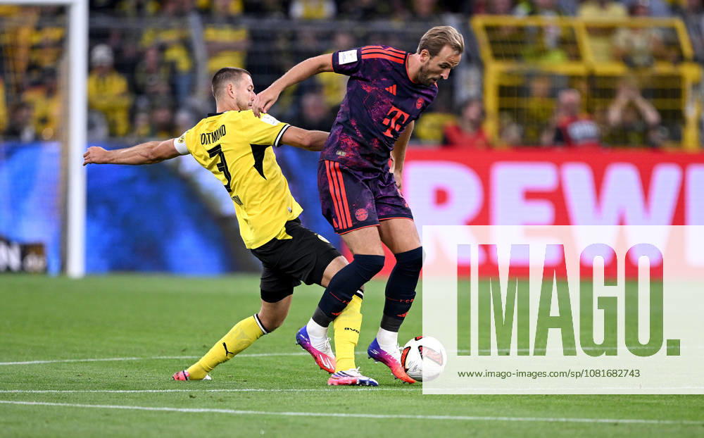 Fussball Supercup Saison 2026 2027 22.08.2026 Borussia Dortmund - FC Bayern Muenchen Waldemar Anton (li, Borussia Dortmund) gegen Harry Kane (re, FC Bayern Muenchen)