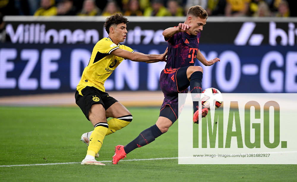 Fussball Supercup Saison 2026 2027 22.08.2026 Borussia Dortmund - FC Bayern Muenchen Samuele Inacio (li, Borussia Dortmund) gegen Joshua Kimmich (re, FC Bayern Muenchen)