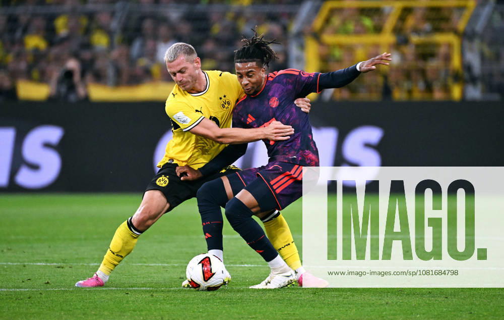 Dortmund, Germany, 1. Bundesliga, Supercup, Signal Iduna Park Dortmund, Bor. Dortmund vs FC Bayern München; Julian Ryerson (BVB), Michael Olise (FCB). Action.