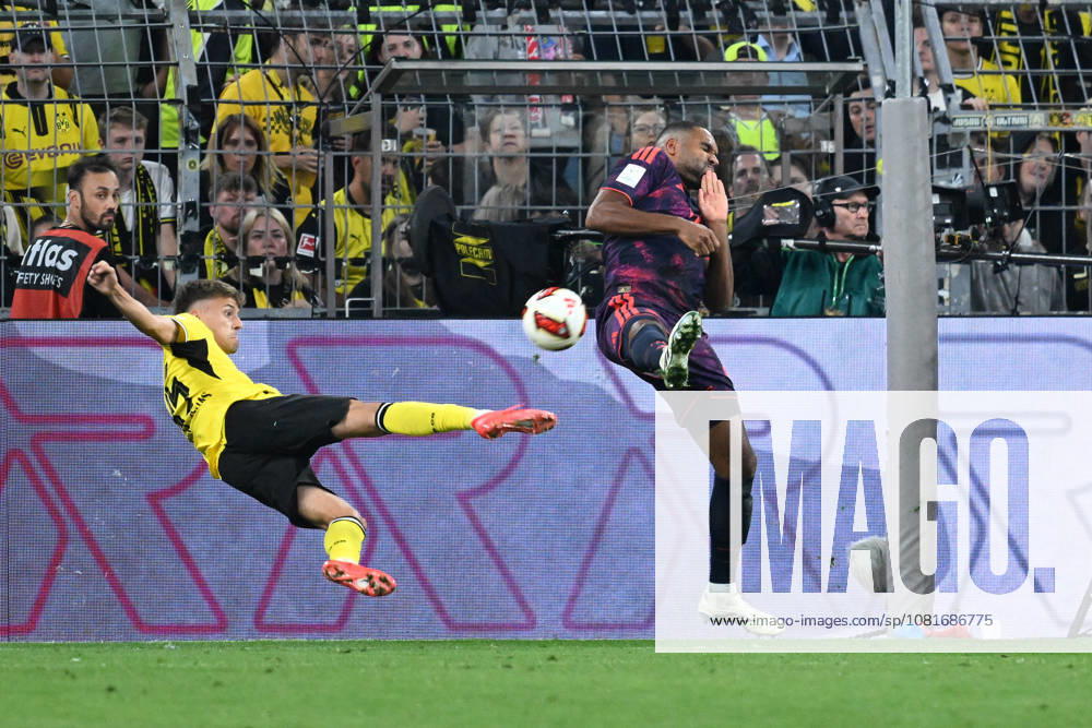 Fussball Franz Beckenbauer Supercup 2026, Borussia Dortmund - FC Bayern München v.l. Giannis Konstantelias (Borussia Dortmund) Jonathan Tah (FC Bayern Muenchen) Zweikampf, Aktion, action, battle for the ball Dortmund