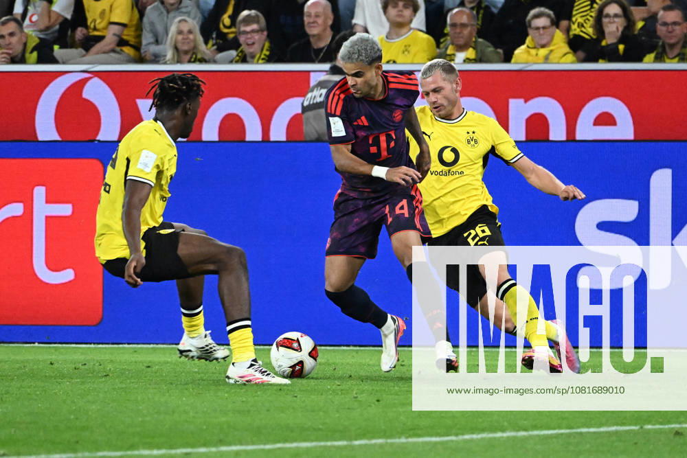 Fussball Franz Beckenbauer Supercup 2026, Borussia Dortmund - FC Bayern München v.l. Joane Gadou (Borussia Dortmund) Luis Diaz (FC Bayern Muenchen) Julian Ryerson (Borussia Dortmund) Zweikampf, Aktion, action, battle for the ball Dortmund