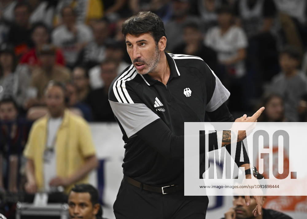 Germany v Croatia - Turkish Airlines Supercup 2026 HAMBURG, GERMANY - AUGUST 22: Germany s head coach Alex Mumbru gives tactics during the Turkish Airlines Basketball Supercup 2026 match between Germany and Croatia at Barclays Arena in Hamburg, Germany, on August 22, 2026. Halil Sagirkaya Anadolu Hamburg Germany. Editorial use only. Please get in touch for any other usage.