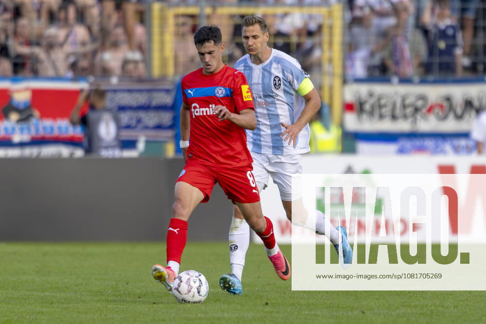 München, Deutschland 22. August 2026: DFB-Pokal - 2026 2027 - 1. Runde - TSV 1860 München gegen Holstein Kiel Im Bild: v. li. im Zweikampf Guillermo Balzi (Kiel) und Dennis Dressel (TSV) DFB DFL regulations prohibit any use of photographs as image sequences and or quasi-video Grünwalder Stadion Bayern